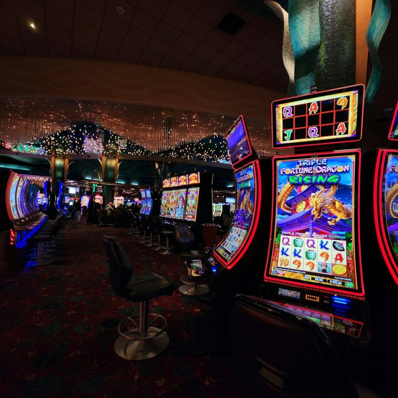 a casino room filled with lots of slot machines